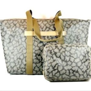 Yves Saint Laurent Travel Bag & Clutch